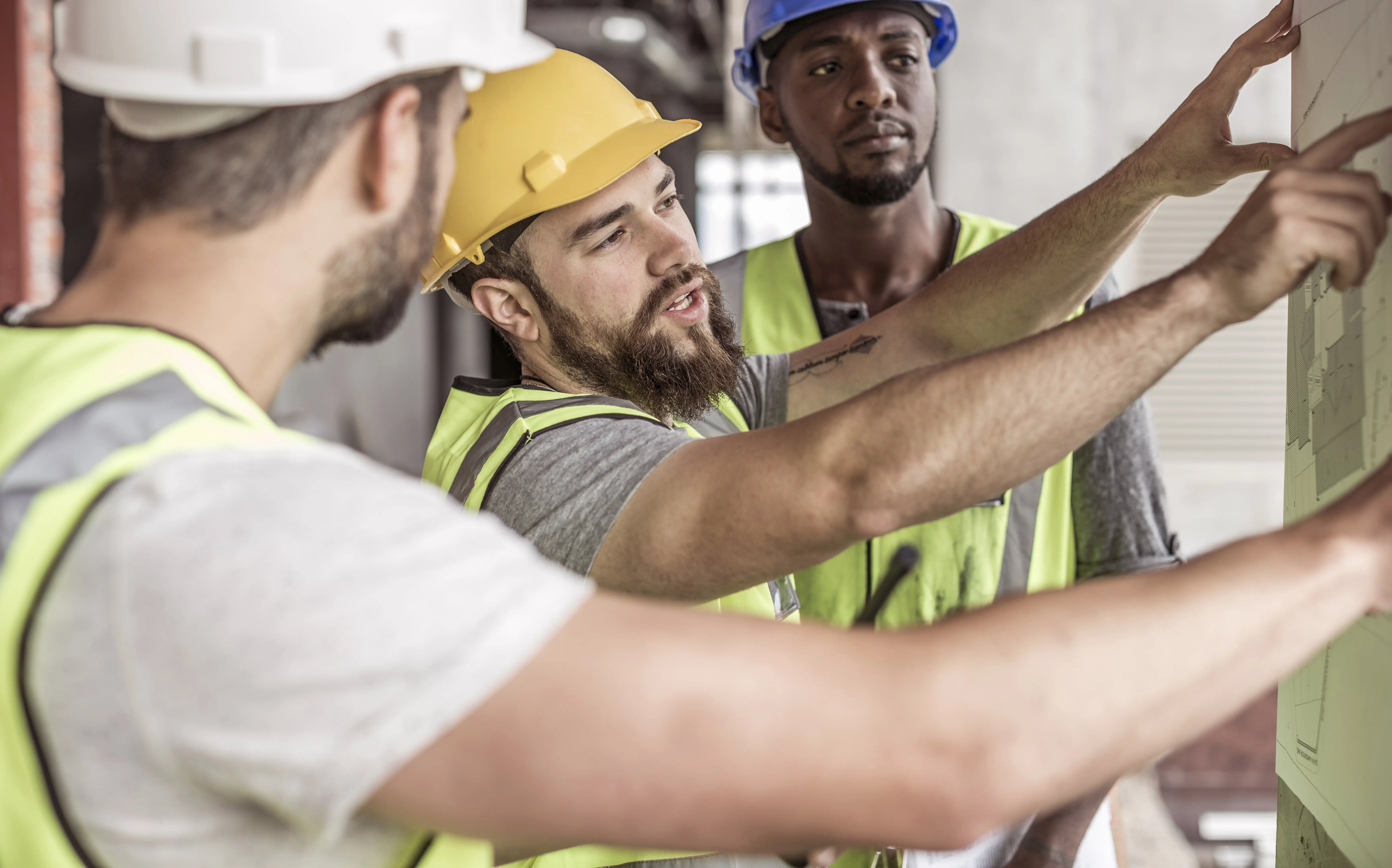 Castle Innovations builders reviewing construction details